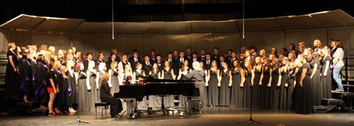 All SHHS Choirs on stage performing